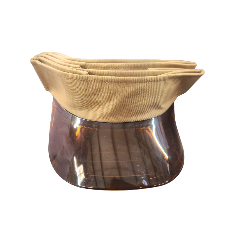 A stack of four disposable face shields with beige fabric tops and clear plastic visors, shown on a plain white background.