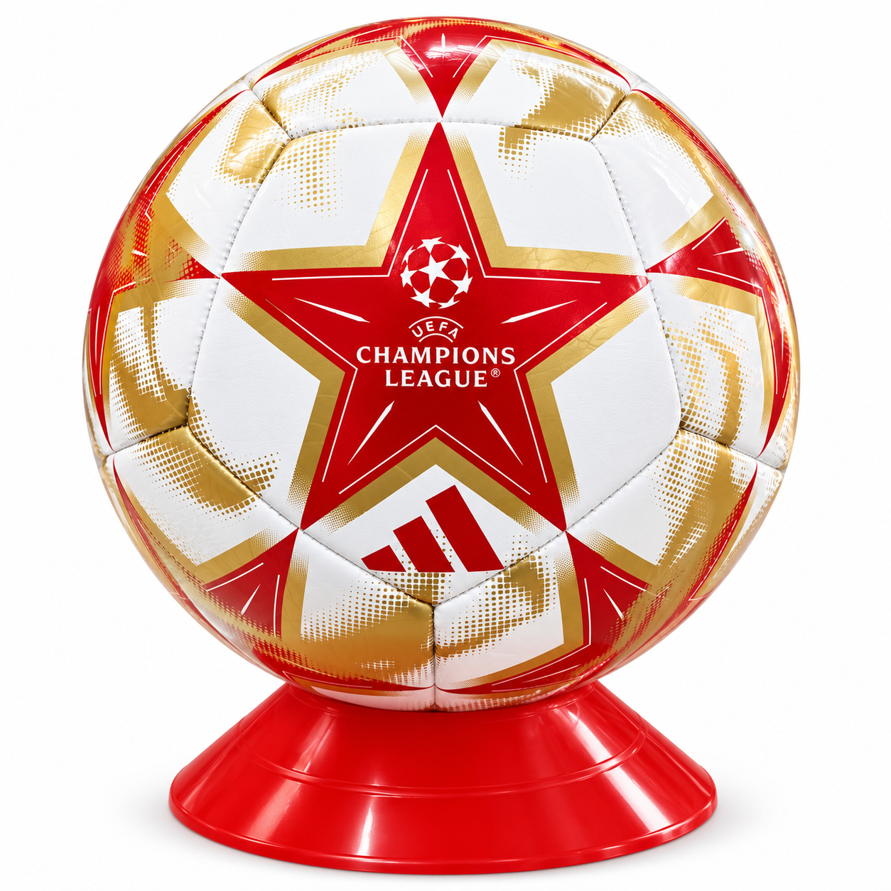 An Adidas UEFA Champions League soccer ball displayed on a red plastic stand against a white background.